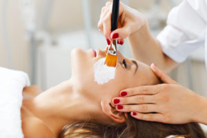 Picture of woman with facial mask in beauty salon